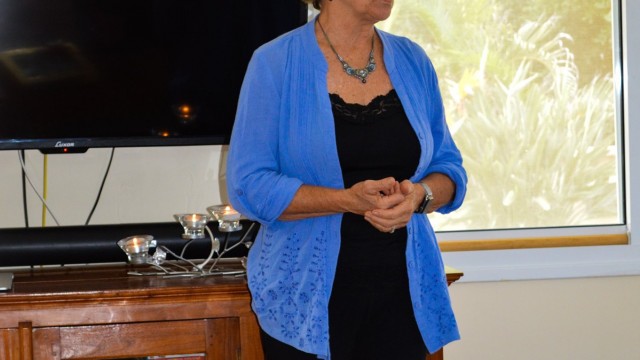 Cindy Bayer welcoming everyone to the event